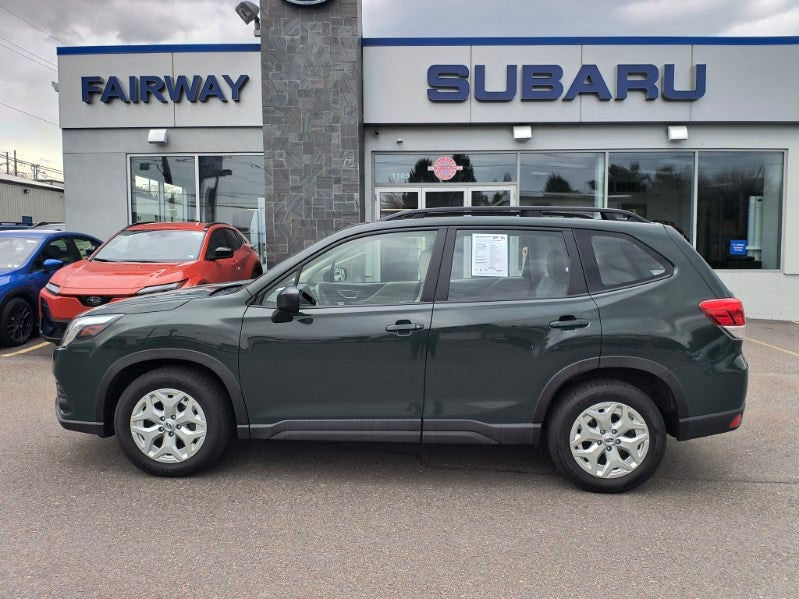 2023 Subaru Forester Base in Greeen — front three-quarter view