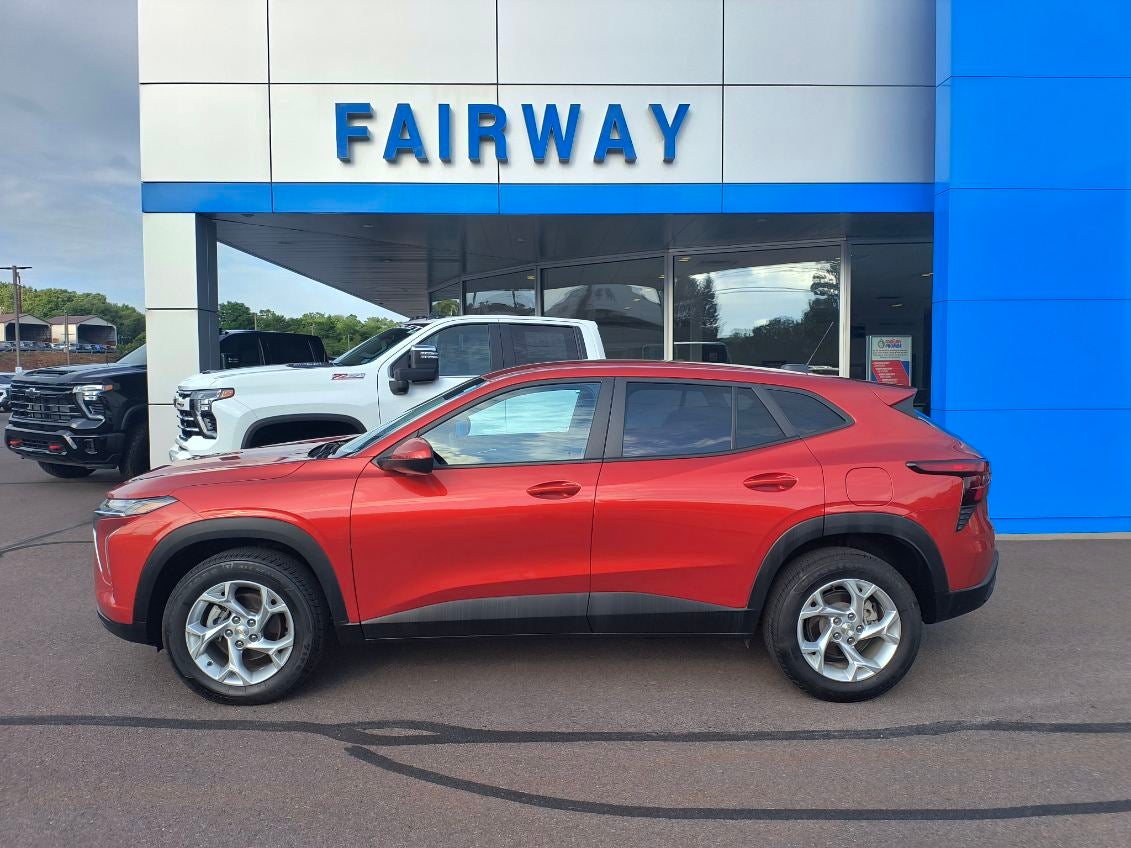 2024 Chevrolet Trax LS in Cayenne Orange Metallic — front three-quarter view